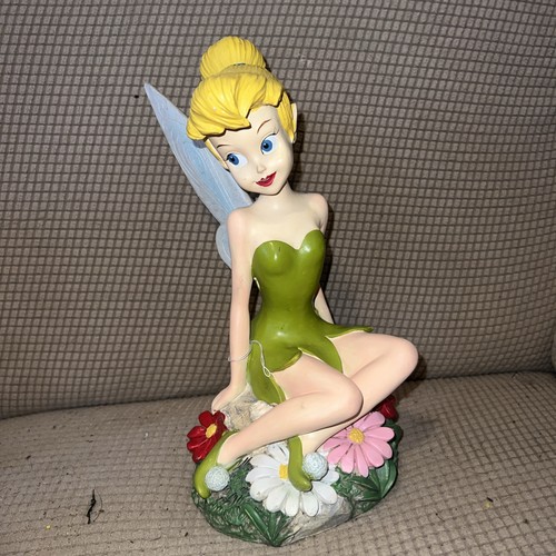 Disney tinkerbell statue hand - tinkerbell,